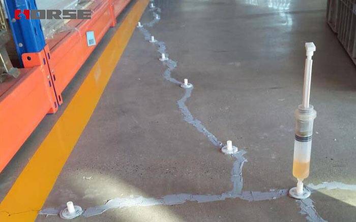 Réparation de fissure de sol en béton injectée