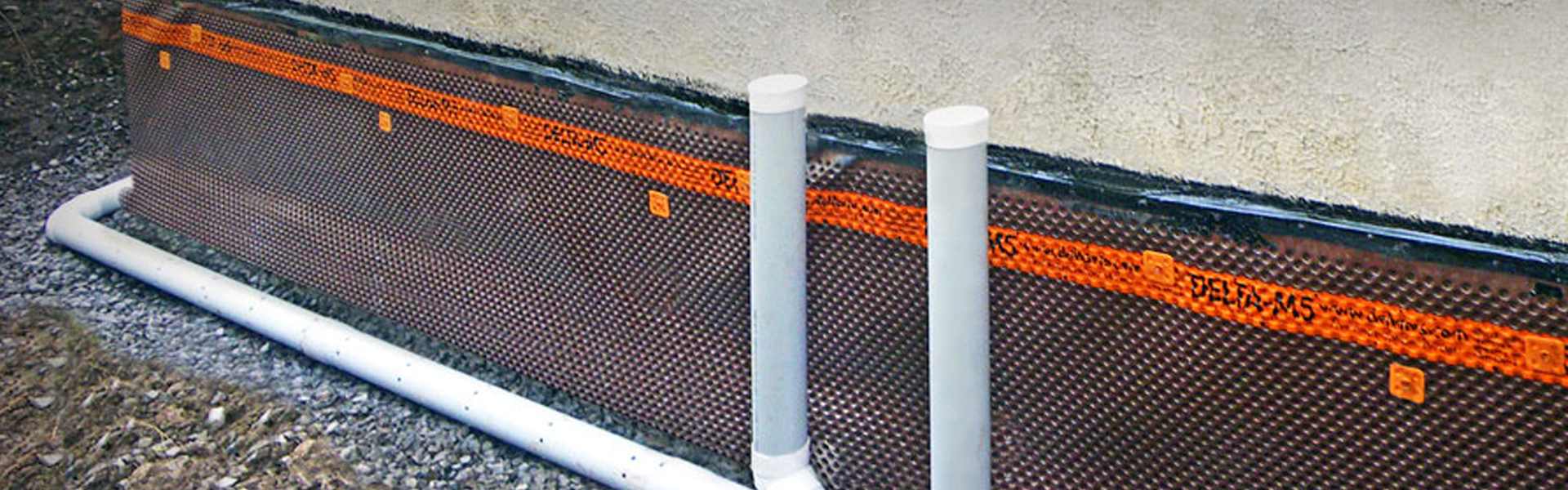 Système de drainage pour étanchéité des murs extérieurs.